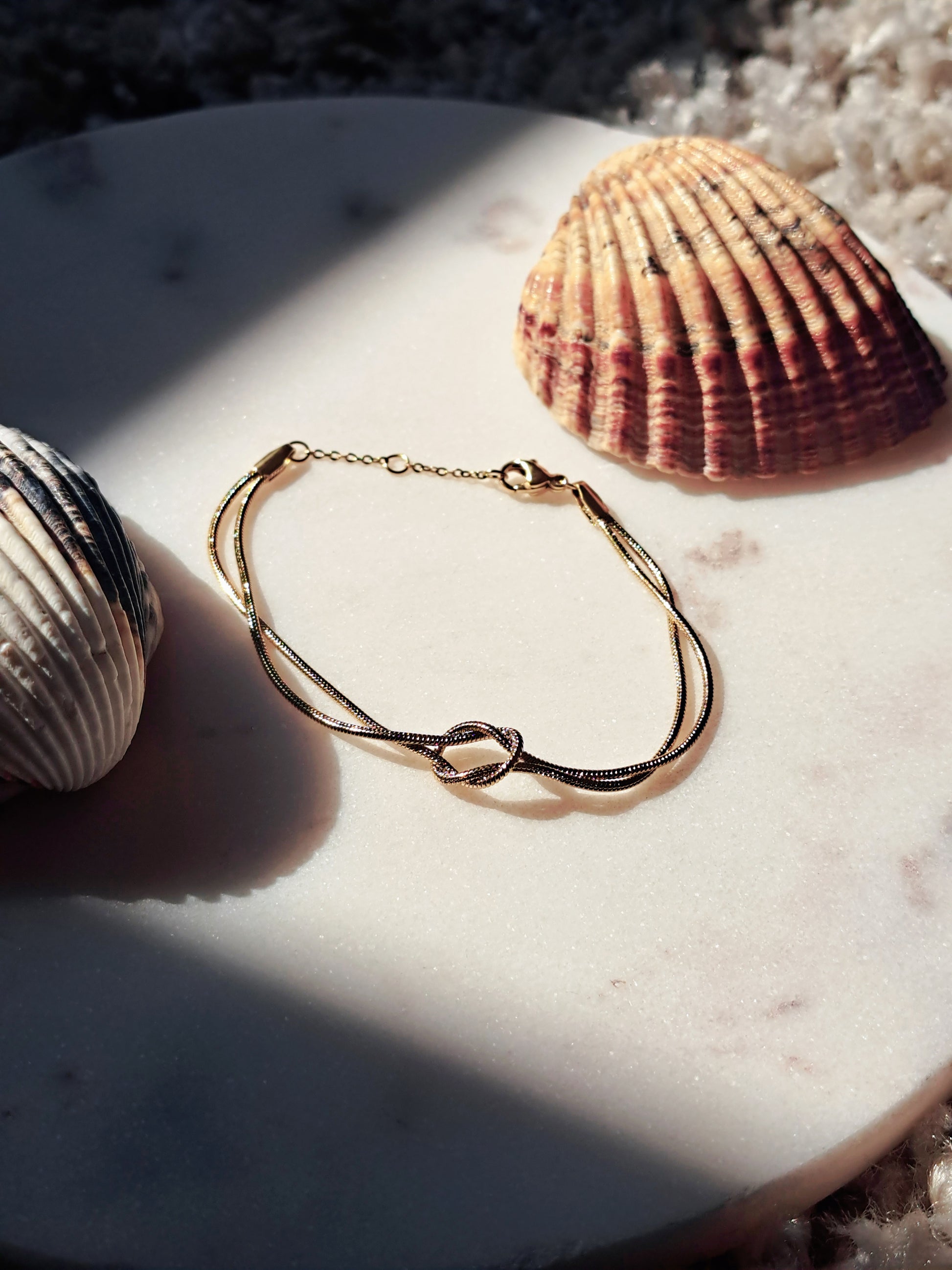 Stainless steel gouden armbandje, geknoopt design