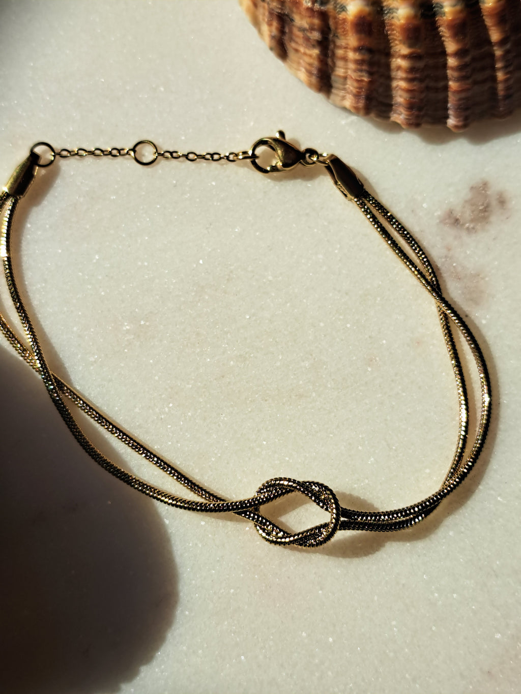 Stainless steel gouden armbandje, geknoopt design