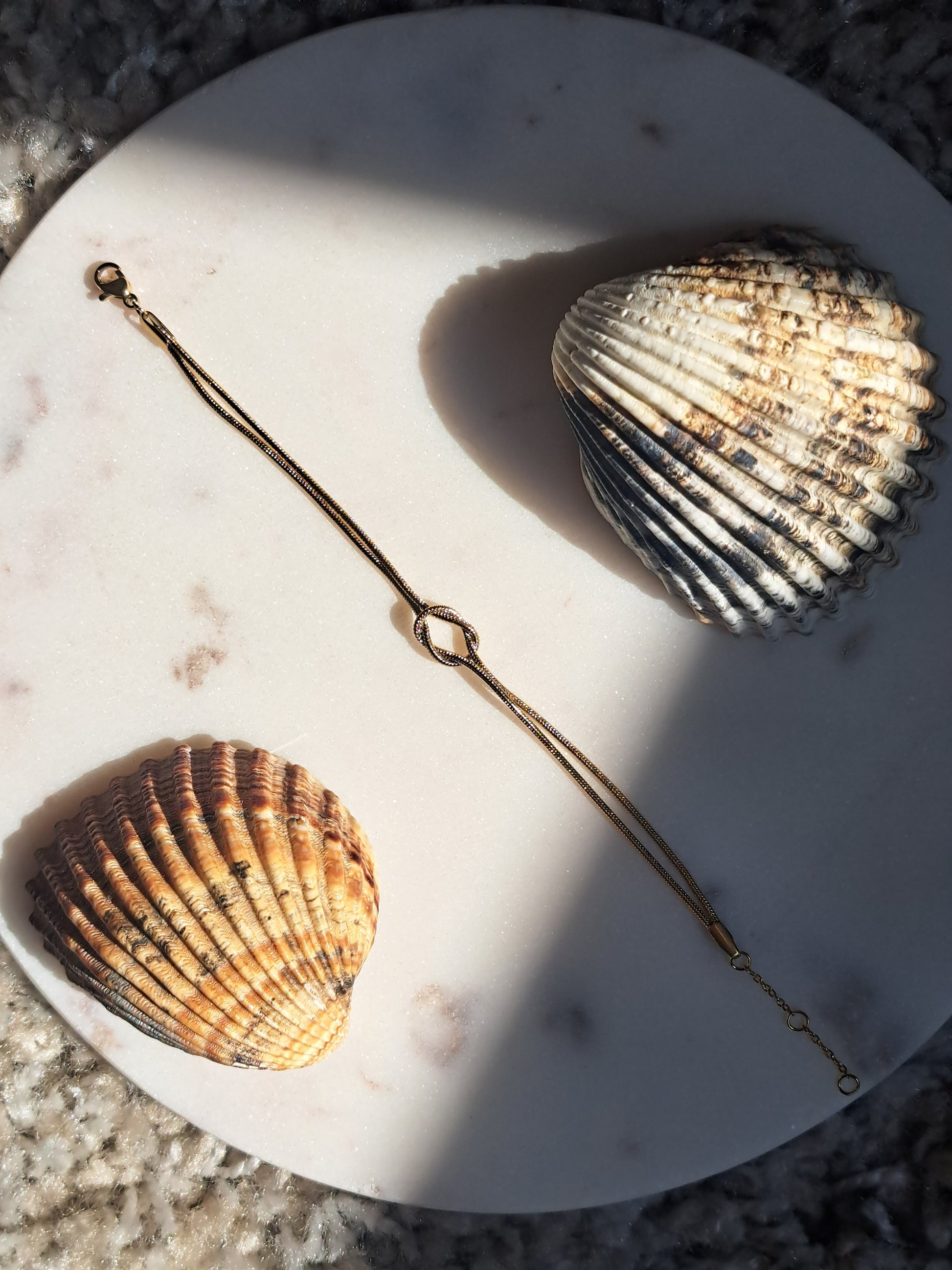 Stainless steel gouden armbandje, geknoopt design