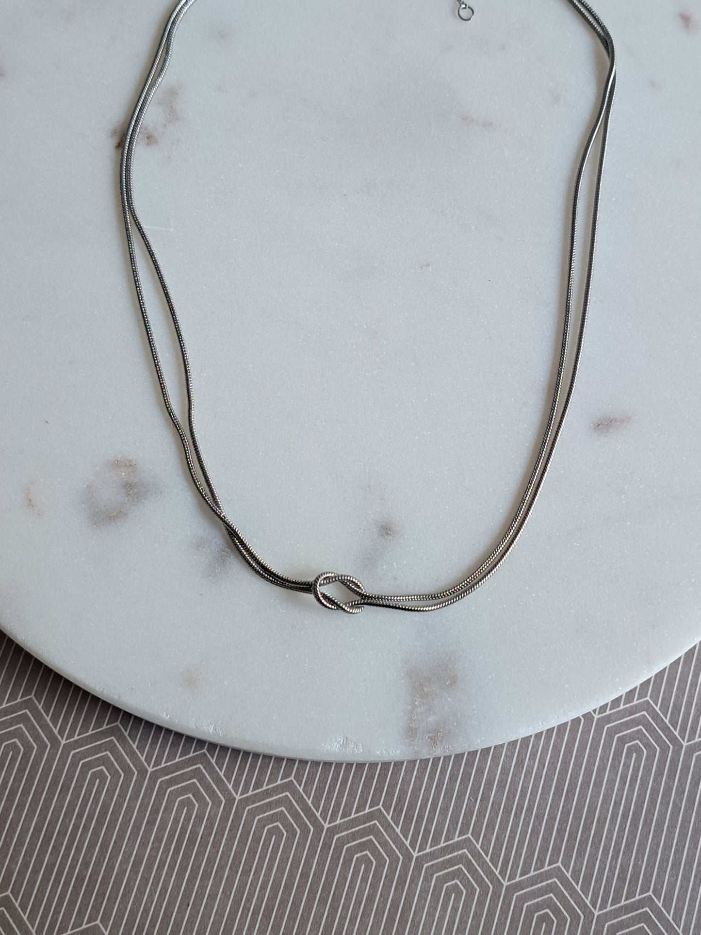 Sissy infinity knot ketting - stainless steel - goud of zilver