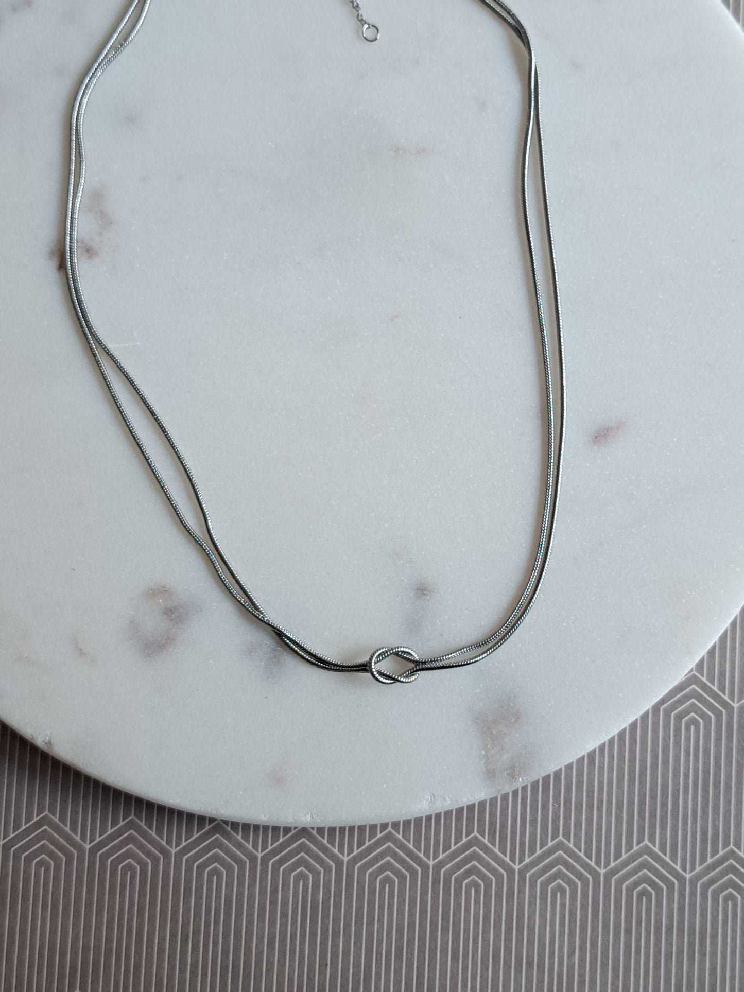 Sissy infinity knot ketting - stainless steel - goud of zilver