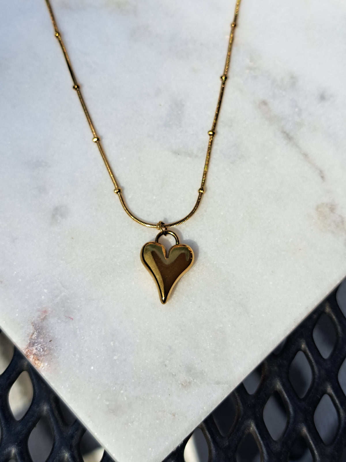 Bolletjes ketting met hartje