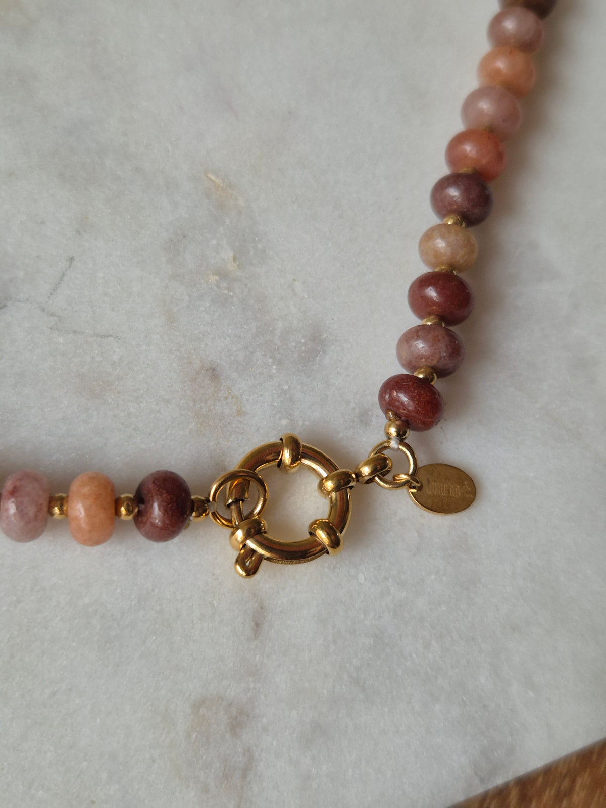 Bruine kralenketting - goud