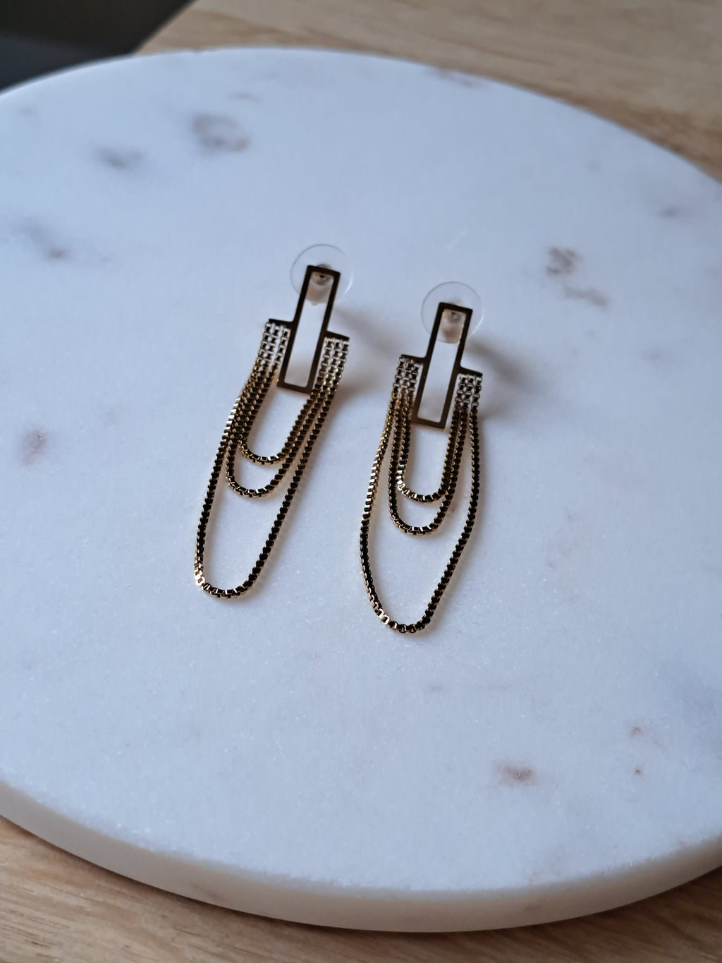 Chique RVS hangoorbellen, goudkleurig