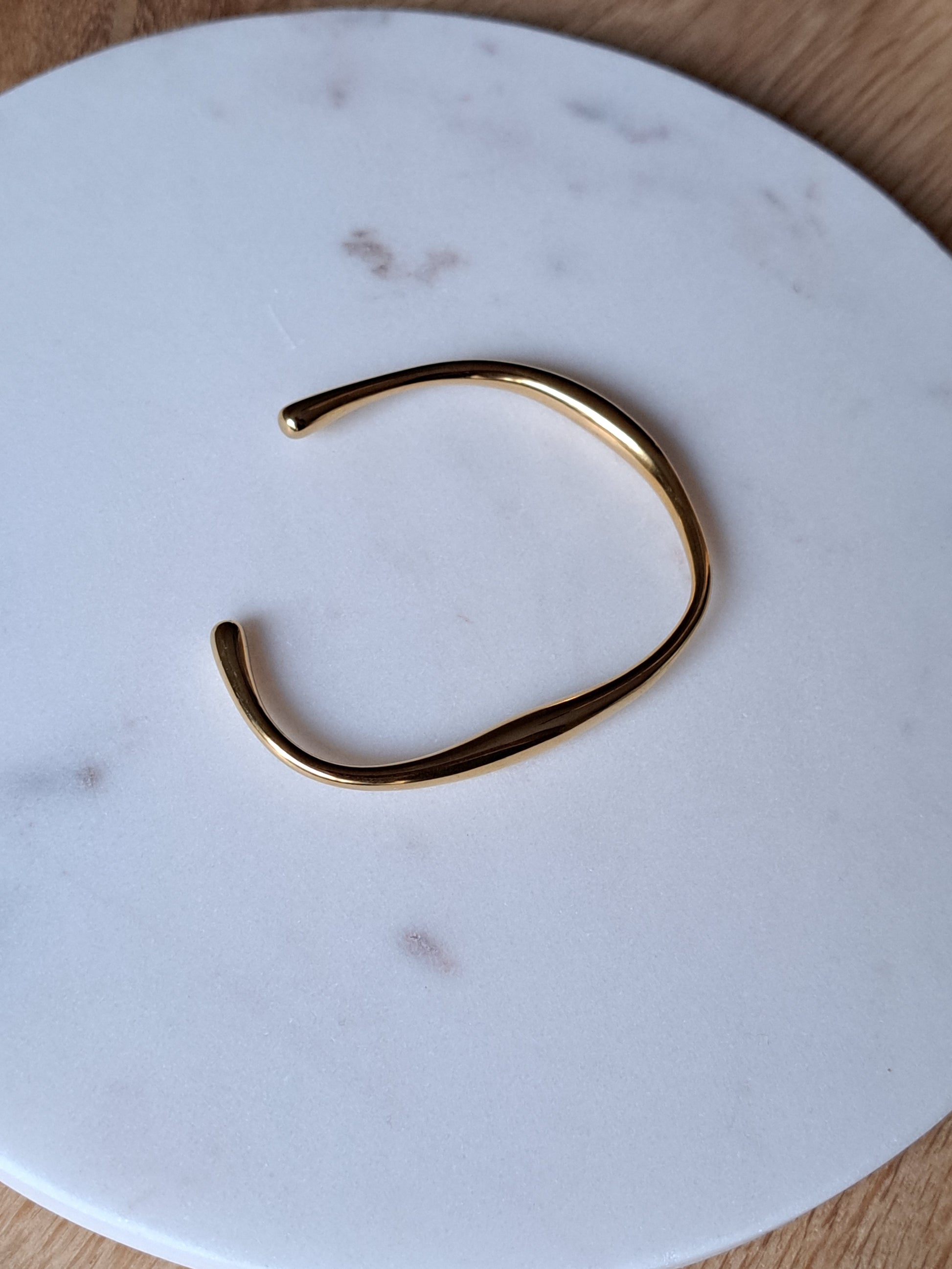 Goudkleurige a symmetrische bangle, roestvrijstaal