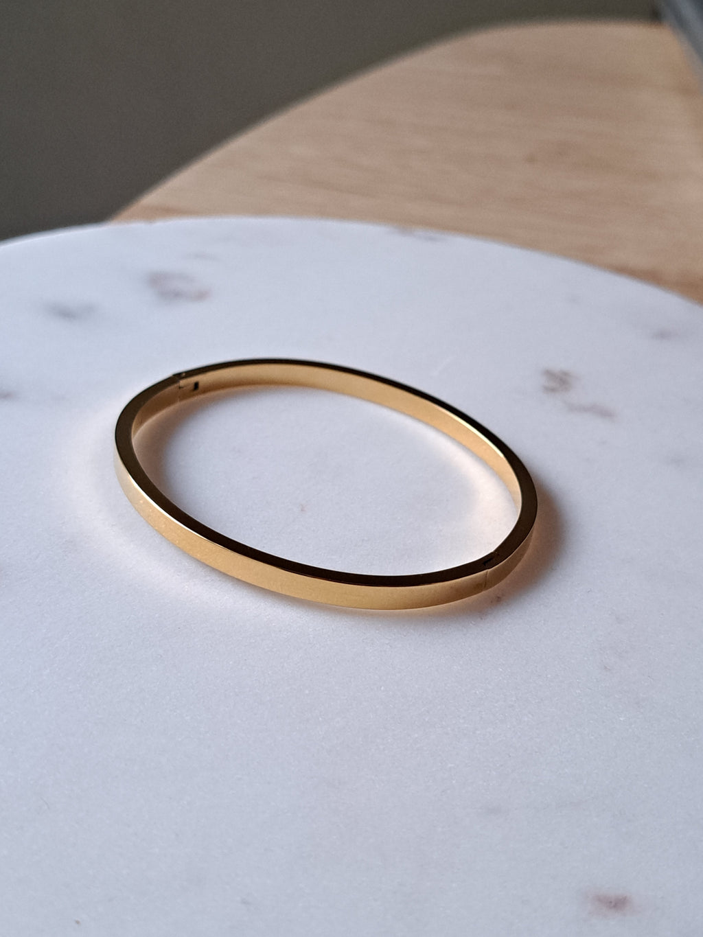 Stainless steel bangle - goudkleurig shiny